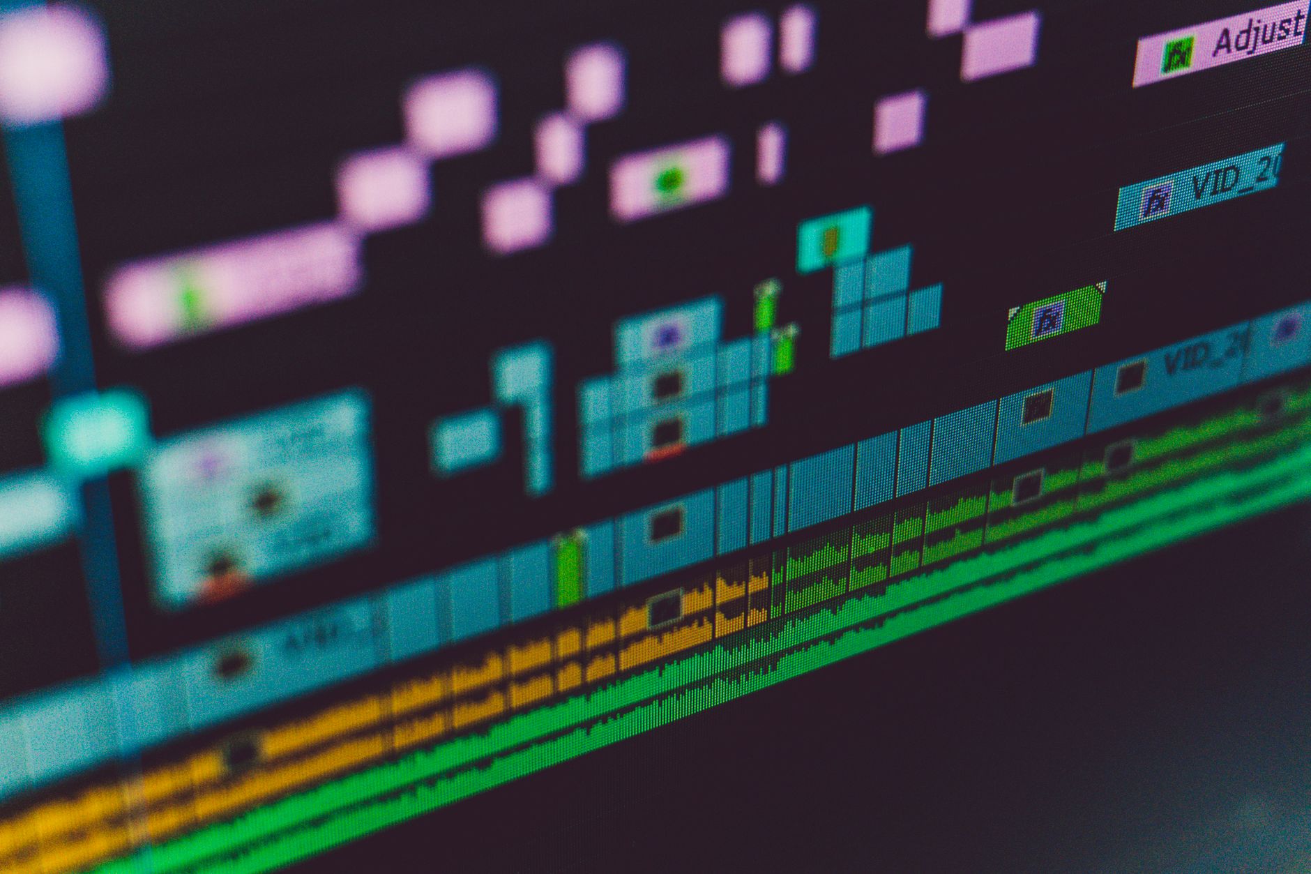a video editor adjusting motion graphics timelines on a computer screen