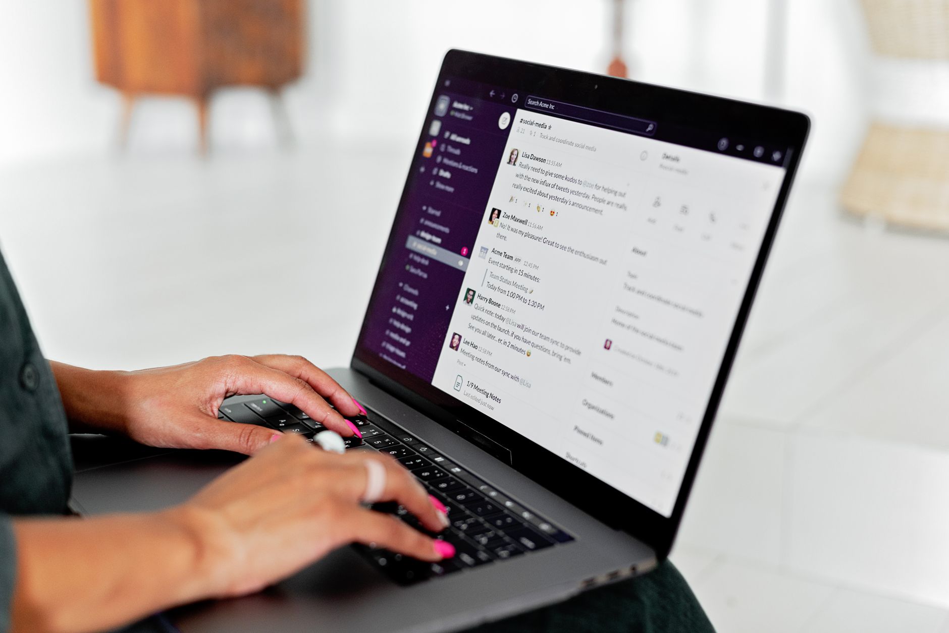 Person typing on a laptop with an open AI chat and copy draft on screen